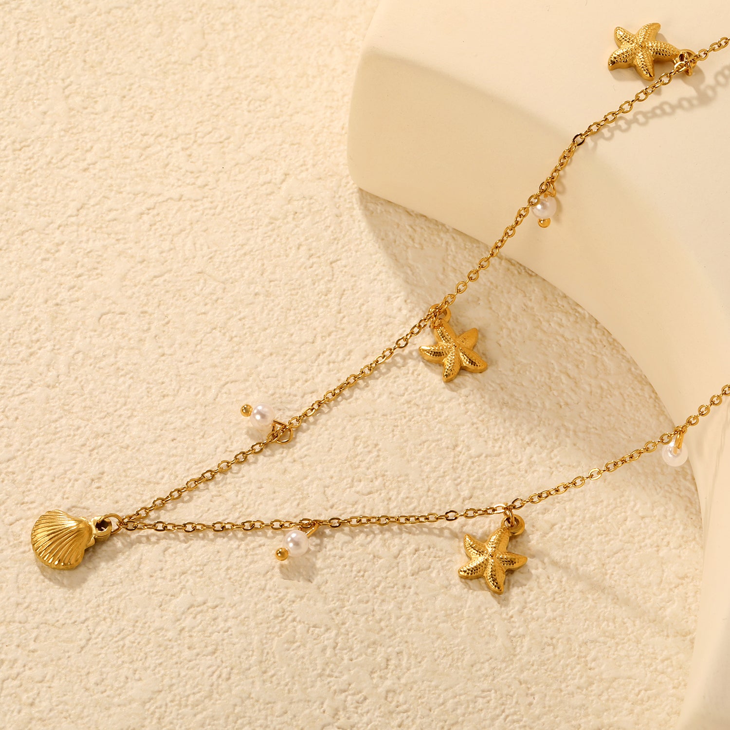 Collar con Charms de Concha, Perla y Estrella de Mar