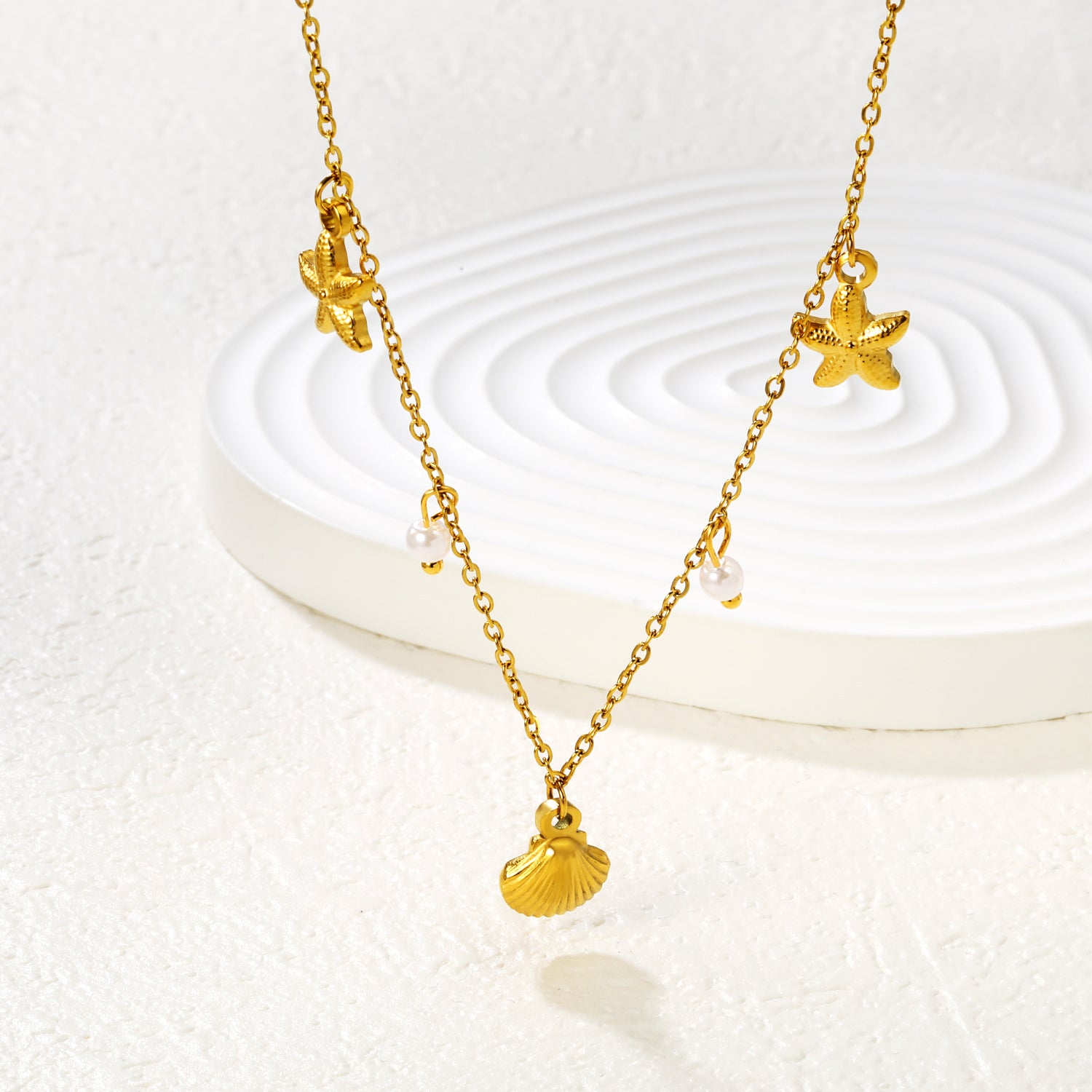 Collar con Charms de Concha, Perla y Estrella de Mar